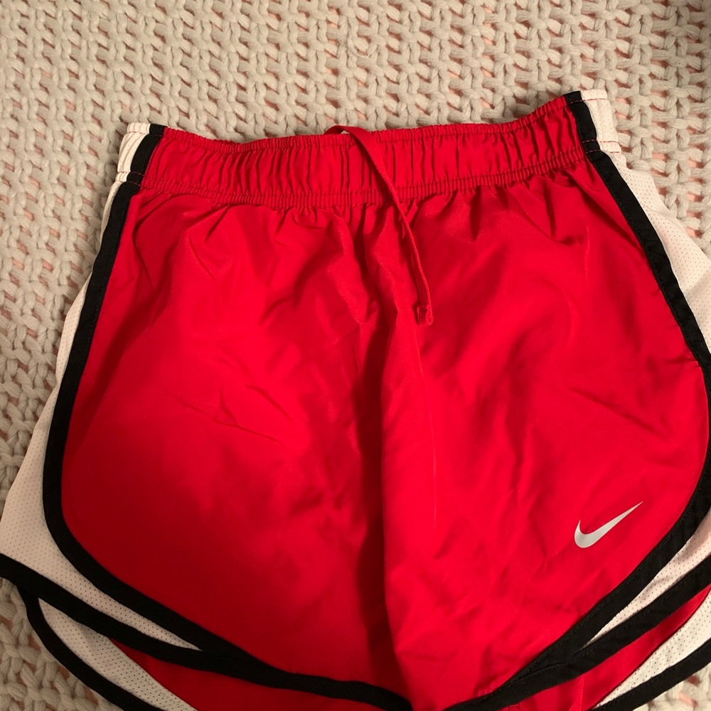red nike shorts